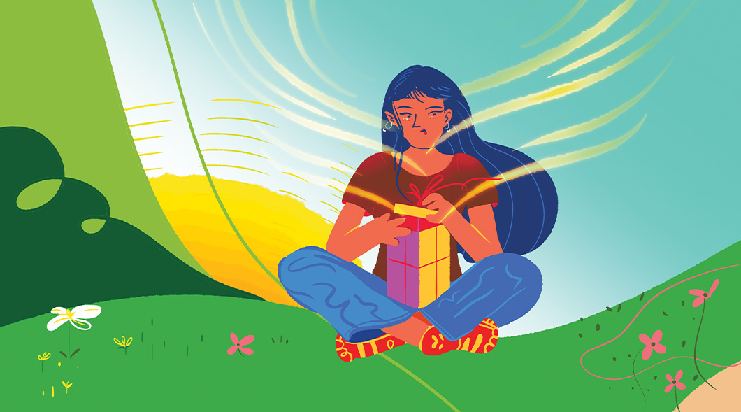 Illustration of a person opening a present in a field