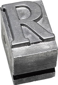 Image of a printing press letter block, R