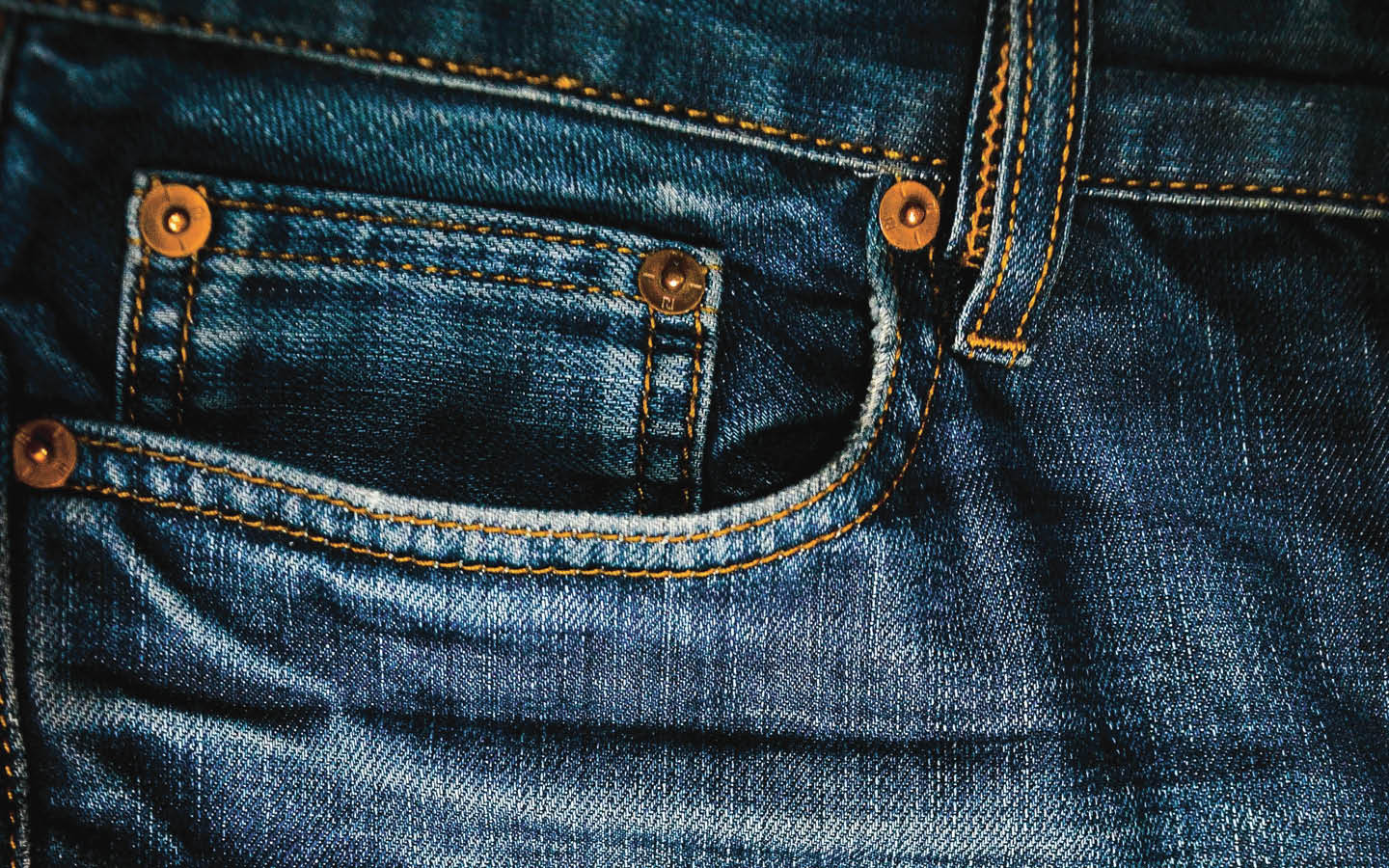 Close-up photo of the pocket of a pair of jeans