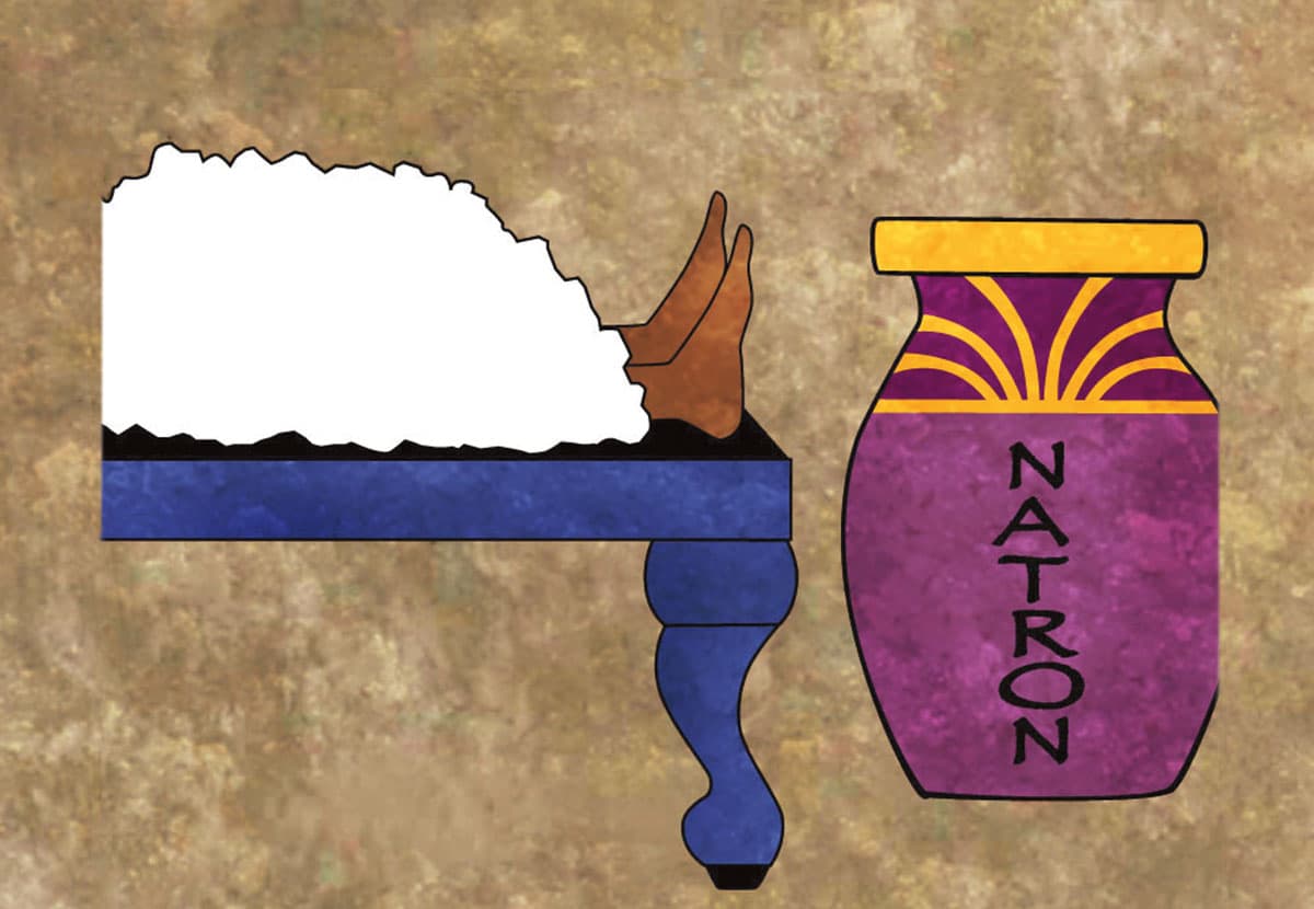 Illustration of a purple jar of natron and a dead body on a table covered in the substance